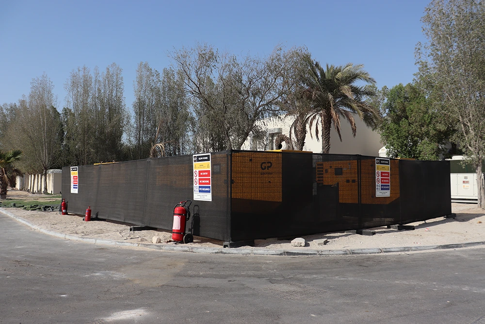 Diesel generator positioned outside a large Ramadan tent in Dubai